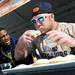 Michigan defensive back Blake Countess, left, encourages teammate offensive linesman Ben Braden as he competes in a pie eating contest against a player from South Carolina at beach day in Clearwater, Fla. on Sunday, Dec. 30. Braden finished five pies but lost to South Carolina. Melanie Maxwell I AnnArbor.com